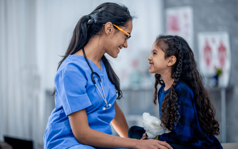 Doctor speaking with child