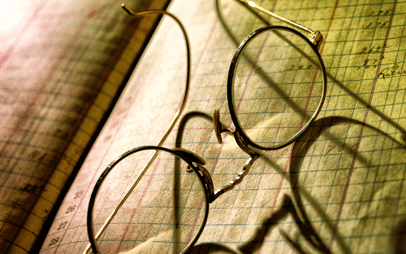 Glasses sitting on notebook