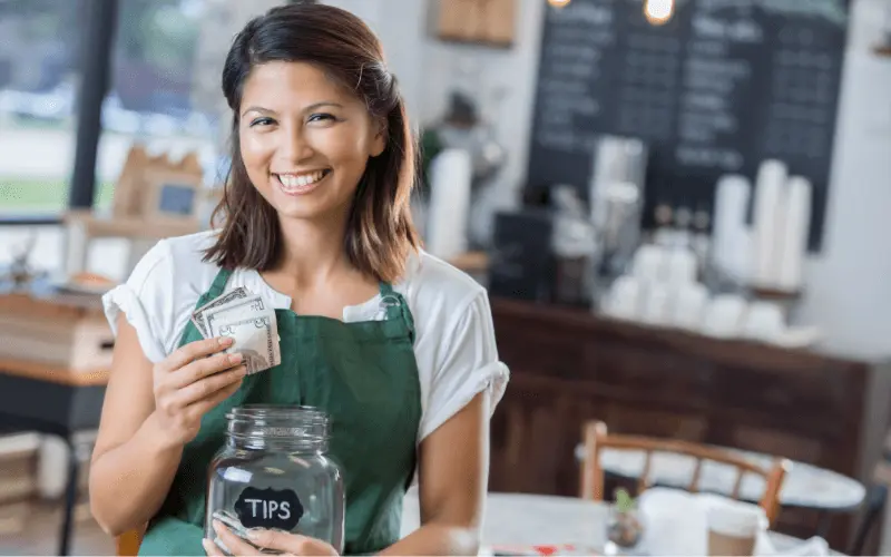 California employee looking at her money from tips