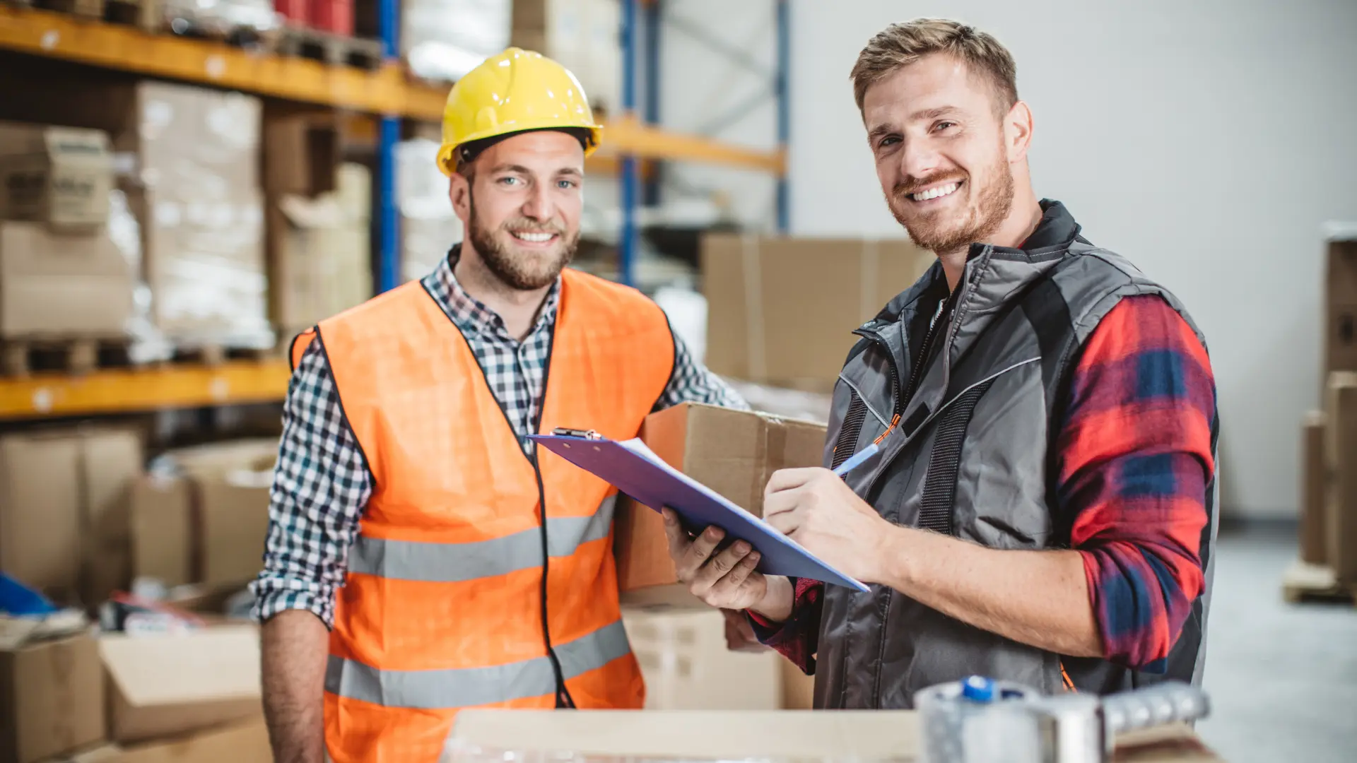 Two employees smiling