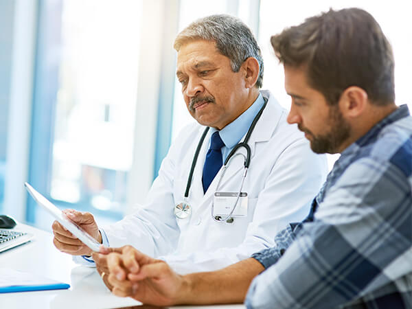 Employees discussing their health insurance options